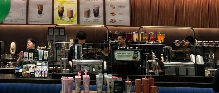 The espresso machines, on the right of the cash registers