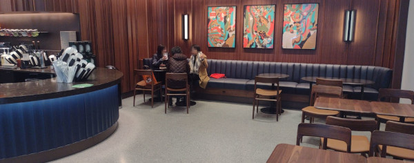 The wheelchair table, at the right end of the bench seating